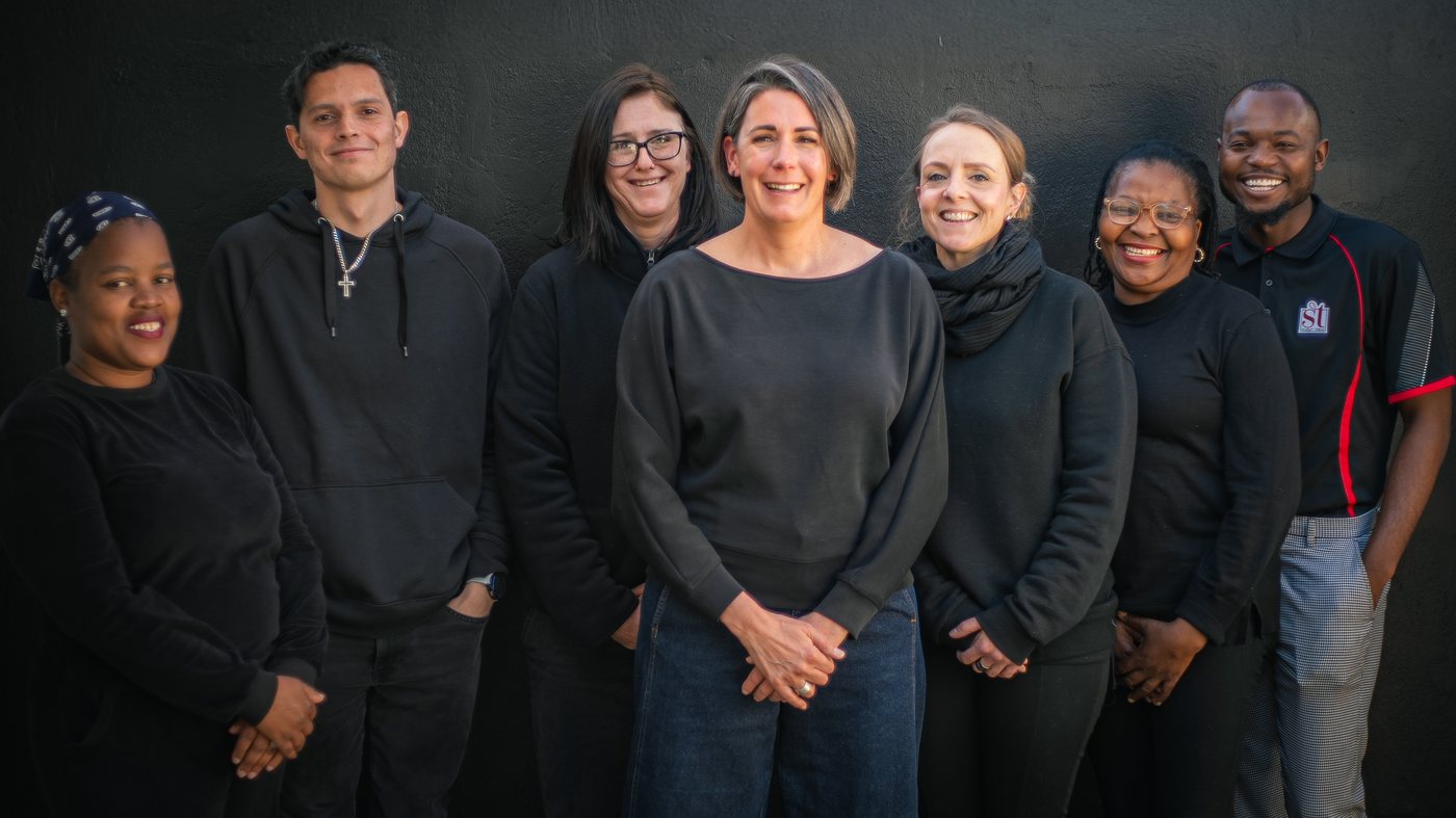 The Scarlet Thread Designs team